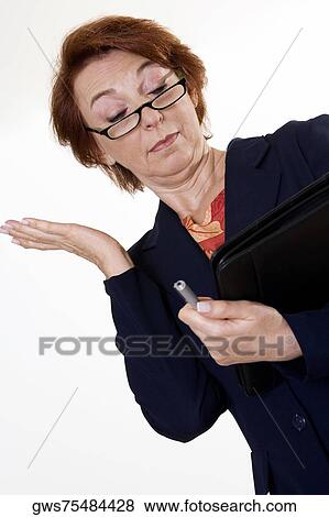 Low angle view of a businesswoman gesturing View Large Photo Image Stock Photo - Low angle view of a businesswoman gesturing. Fotosearch