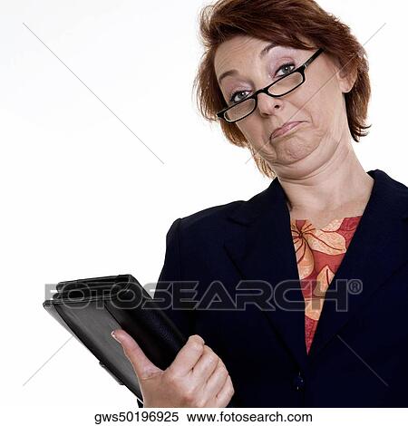 Low angle view of a businesswoman holding a file View Large Photo Image Stock Photography - Low angle view of a businesswoman holding a file. Fotosearch