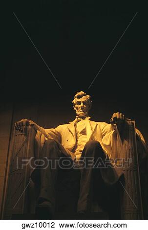 Stock Image - Low angle view of an Abraham Lincoln statue, Lincoln Memorial, Washington DC, USA. Fotosearch