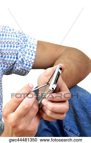 Man operating a personal data assistant View Large Photo Image Stock Image - Man operating a personal data assistant. Fotosearch