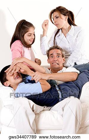 Parents and their two children View Large Photo Image Stock Photo - Parents and their two children. Fotosearch
