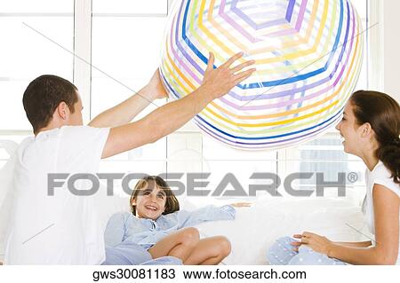 Parents playing with their daughter View Large Photo Image Stock Image - Parents playing with their daughter. Fotosearch