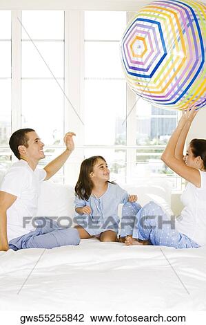 Parents playing with their daughter View Large Photo Image Stock Image - Parents playing with their daughter. Fotosearch