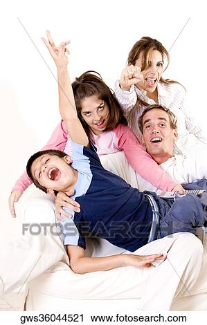 Parents sitting with their son and daughter View Large Photo Image Stock Image - Parents sitting with their son and daughter. Fotosearch