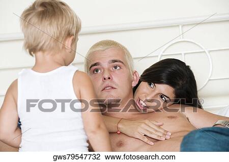 Parents talking to their son View Large Photo Image Stock Image - Parents talking to their son. Fotosearch