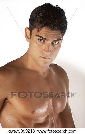 Portrait of a bare chested young man looking serious View Large Photo Image Stock Image - Portrait of a bare chested young man looking serious. Fotosearch