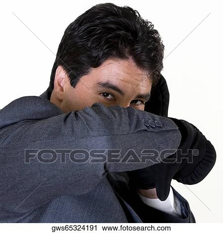 Portrait of a businessman wearing boxing gloves View Large Photo Image Stock Image - Portrait of a businessman wearing boxing gloves. Fotosearch