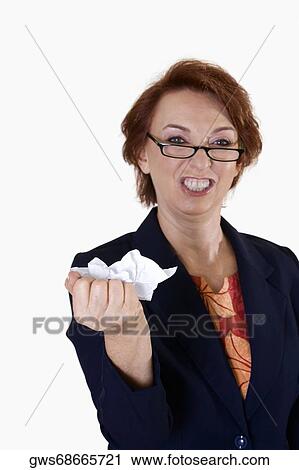 Portrait of a businesswoman crushing paper View Large Photo Image Stock Image - Portrait of a businesswoman crushing paper. Fotosearch