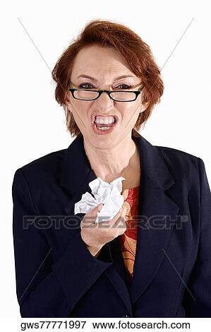 Portrait of a businesswoman crushing paper View Large Photo Image Stock Photo - Portrait of a businesswoman crushing paper. Fotosearch