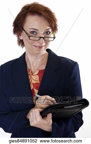 Stock Image - Portrait of a businesswoman holding a file. Fotosearch