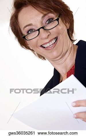 Stock Image - Portrait of a businesswoman smiling. Fotosearch