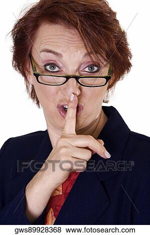 Portrait of a businesswoman with her finger on her lips View Large Photo Image Stock Photo - Portrait of a businesswoman with her finger on her lips. Fotosearch