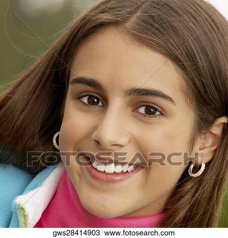 Portrait of a girl smiling View Large Photo Image Stock Image - Portrait of a girl smiling. Fotosearch