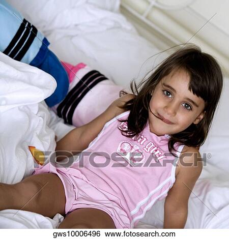 Stock Photograph - Portrait of a girl smiling. Fotosearch