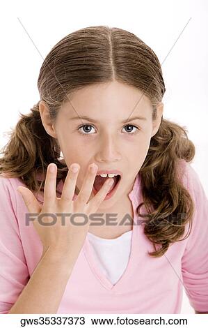 Portrait of a girl with her finger in her mouth View Large Photo Image Stock Image - Portrait of a girl with her finger in her mouth. Fotosearch