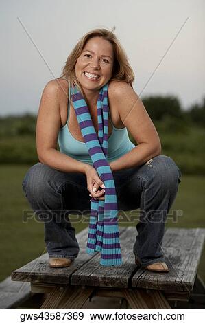 Stock Photo - Portrait of a mature woman smiling. Fotosearch