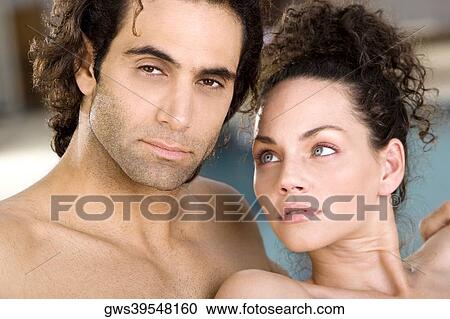 Portrait of a mid adult man and a young woman at the poolside View Large Photo Image Stock Image - Portrait of a mid adult man and a young woman at the poolside. Fotosearch