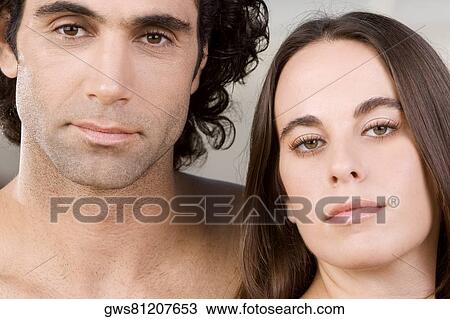 Portrait of a mid adult man and a young woman View Large Photo Image Stock Image - Portrait of a mid adult man and a young woman. Fotosearch