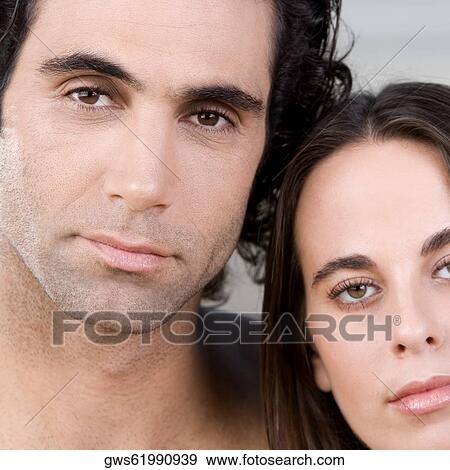 Portrait of a mid adult man and a young woman View Large Photo Image Stock Photo - Portrait of a mid adult man and a young woman. Fotosearch