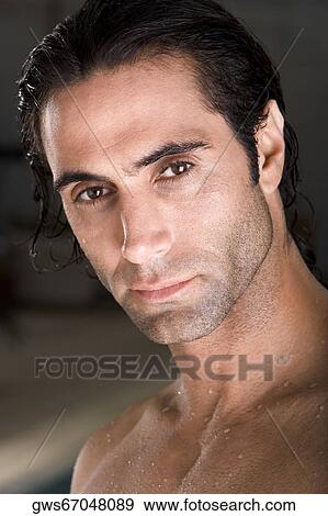 Portrait of a mid adult man looking serious View Large Photo Image Stock Photo - Portrait of a mid adult man looking serious. Fotosearch