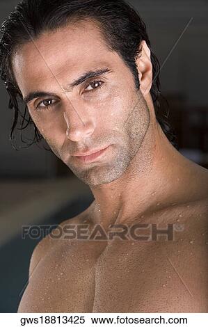 Portrait of a mid adult man looking serious View Large Photo Image Stock Photography - Portrait of a mid adult man looking serious. Fotosearch