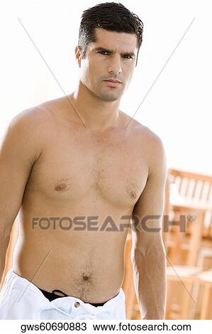 Portrait of a mid adult man standing View Large Photo Image Stock Image - Portrait of a mid adult man standing. Fotosearch