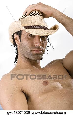 Portrait of a mid adult man wearing a hat View Large Photo Image Stock Photo - Portrait of a mid adult man wearing a hat. Fotosearch