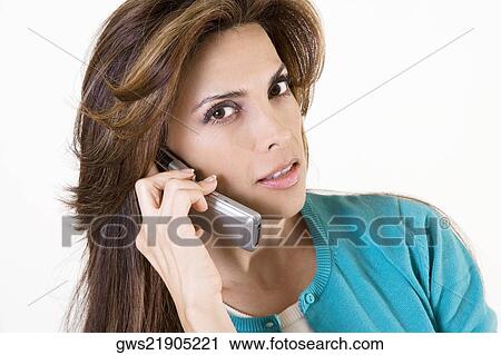 Portrait of a mid adult woman talking on a mobile phone View Large Photo Image Stock Image - Portrait of a mid adult woman talking on a mobile phone. Fotosearch
