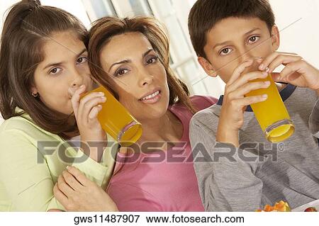 Portrait of a mother and her two children View Large Photo Image Stock Photo - Portrait of a mother and her two children. Fotosearch