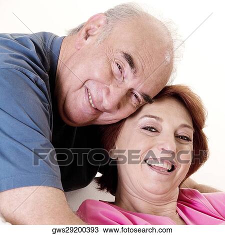 Stock Image - Portrait of a senior couple smiling. Fotosearch