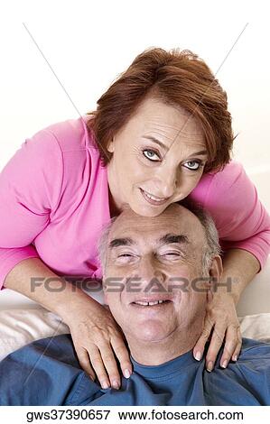 Portrait of a senior couple smiling View Large Photo Image Stock Photo - Portrait of a senior couple smiling. Fotosearch