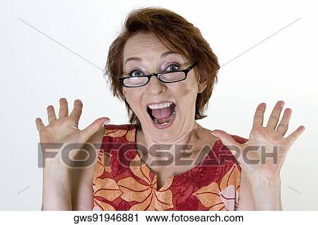 Portrait of a senior woman making a face View Large Photo Image Stock Image - Portrait of a senior woman making a face. Fotosearch