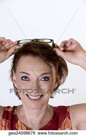 Stock Photo - Portrait of a senior woman smiling. Fotosearch