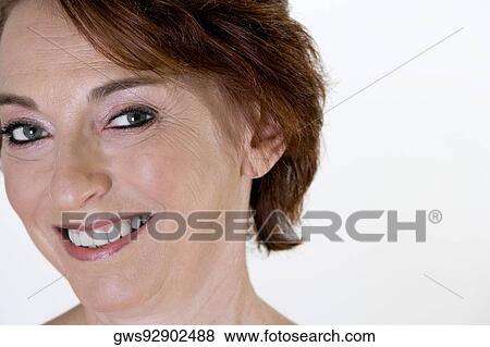 Portrait of a senior woman smiling View Large Photo Image Stock Photo - Portrait of a senior woman smiling. Fotosearch