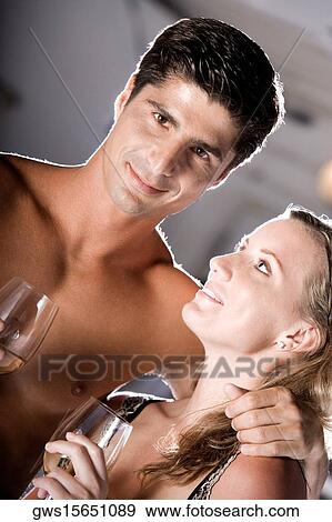 Portrait of a young couple smiling View Large Photo Image Stock Photo - Portrait of a young couple smiling. Fotosearch