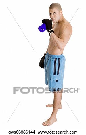 Portrait of a young man drinking water View Large Photo Image Picture - Portrait of a young man drinking water. Fotosearch
