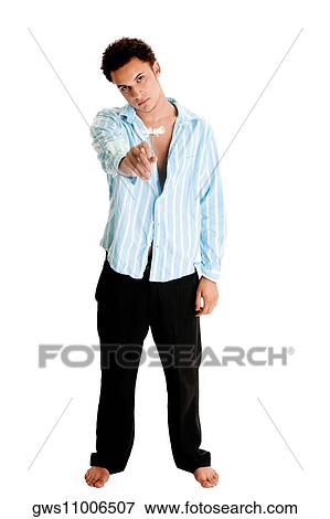 Portrait of a young man holding a flower View Large Photo Image Stock Photo - Portrait of a young man holding a flower. Fotosearch