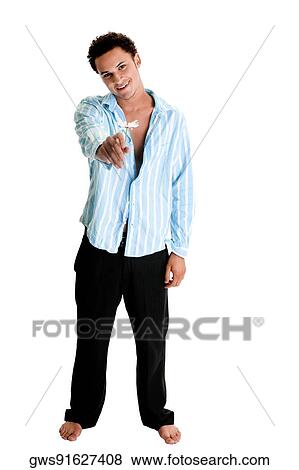 Portrait of a young man holding a flower View Large Photo Image Stock Photo - Portrait of a young man holding a flower. Fotosearch
