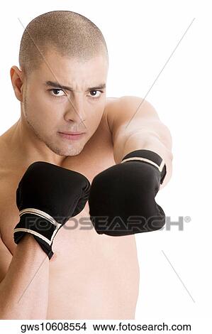 Picture - Portrait of a young man practicing boxing. Fotosearch