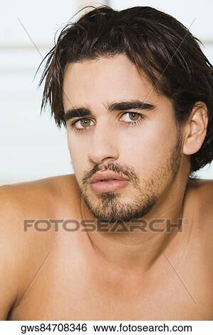 Portrait of a young man View Large Photo Image Stock Photograph - Portrait of a young man. Fotosearch
