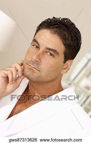 Portrait of a young man thinking View Large Photo Image Stock Photograph - Portrait of a young man thinking. Fotosearch