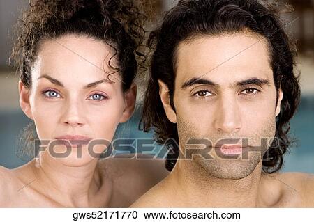 Portrait of a young woman and a mid adult man View Large Photo Image Stock Image - Portrait of a young woman and a mid adult man. Fotosearch