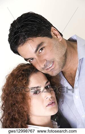 Portrait of a young woman and a mid adult man View Large Photo Image Stock Photo - Portrait of a young woman and a mid adult man. Fotosearch