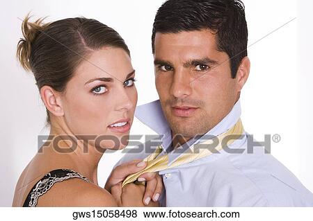 Portrait of a young woman and a mid adult man View Large Photo Image Stock Photo - Portrait of a young woman and a mid adult man. Fotosearch