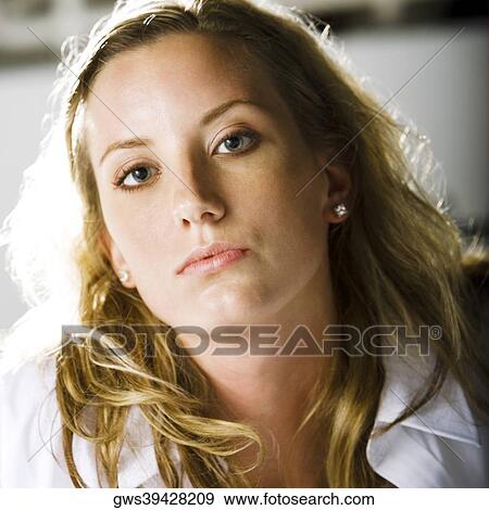 Portrait of a young woman posing View Large Photo Image Stock Photo - Portrait of a young woman posing. Fotosearch