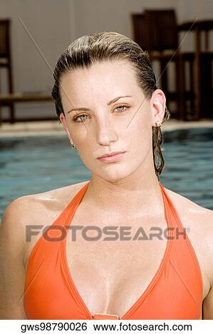 Portrait of a young woman posing View Large Photo Image Stock Photograph - Portrait of a young woman posing. Fotosearch