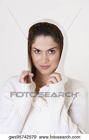 Portrait of a young woman smiling View Large Photo Image Stock Photo - Portrait of a young woman smiling. Fotosearch