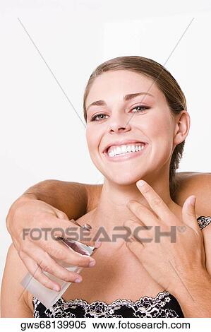 Portrait of a young woman smiling View Large Photo Image Stock Photography - Portrait of a young woman smiling. Fotosearch