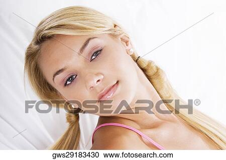 Portrait of a young woman View Large Photo Image Stock Image - Portrait of a young woman. Fotosearch