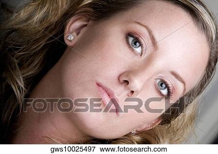 Portrait of a young woman View Large Photo Image Stock Photo - Portrait of a young woman. Fotosearch